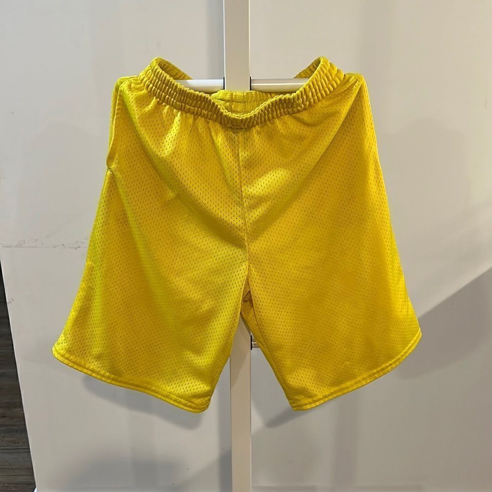 Starter size 10/12 youth boys yellow athletic shorts.